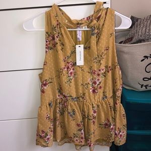 Francesca’s tank top.